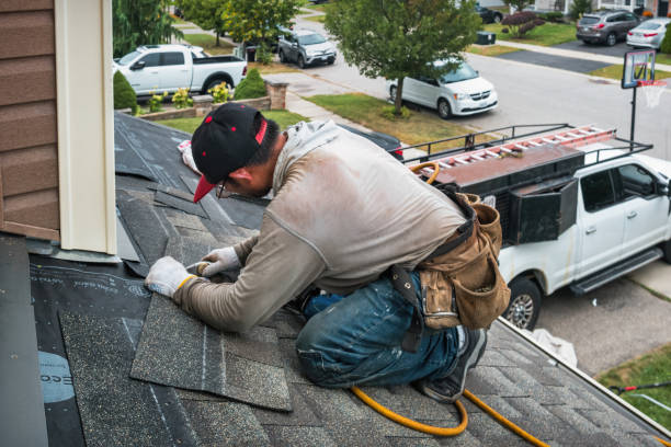Professional Storm Damage Roof Repair technician working in Highlands, NC